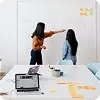 A woman presenting a meeting